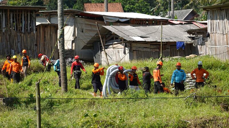 Rescuers prepare to save miners trapped at an illegal mining area in Banyumas (Agus Fitrah/AP)