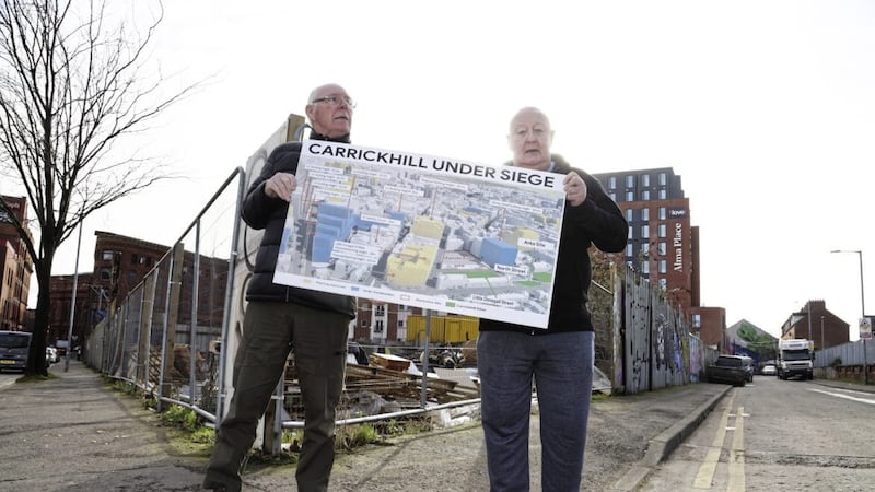 Housing campaigners Gerard Brophy and Frank Dempsey have raised concerns over social housing in north Belfast. Picture by Hugh Russell. 