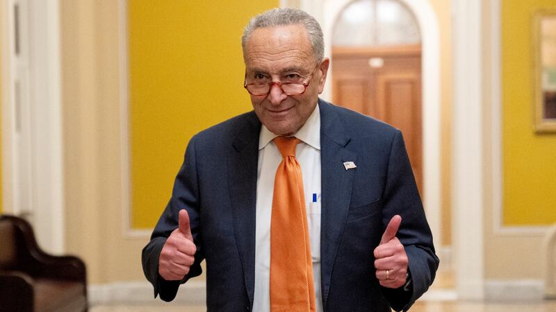 Senate majority leader Chuck Schumer gives two thumbs up as the Senate votes to approve a 45-day funding bill to keep federal agencies open (Andrew Harnik, AP)