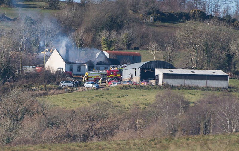 Emergency services attend the scene of the house fire at Molly Road, Derrylin in Co Fermanagh this morning.  Photo: Pacemaker&nbsp;