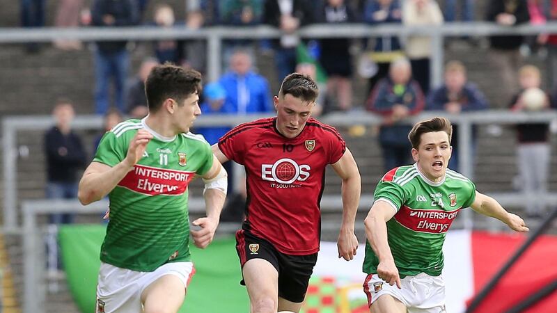 Down's Conor Francis and Mayo's Conor Loftus and Fergal Boland in action during the GAA Football All-Ireland Senior Championship Round 2 between Down and Mayo in Pairc Esler on Saturday June 22 2019. Picture by Philip Walsh.
