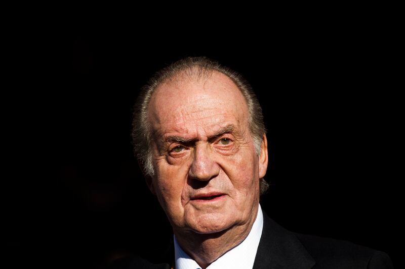 Spain’s King Juan Carlos leaves after the official opening of the Parliament in Madrid in December 2011 (Daniel Ochoa de Olza/AP)