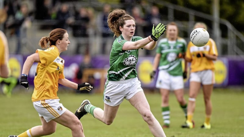 Emma Kelly (Antrim) moves in to close down Limerick&#39;s Loretta Hanley in the Lidl Ladies Football National League Division 4 Final at Clane, Co. Kildare on April 30 2016. Picture by Matt Browne / SPORTSFILE 