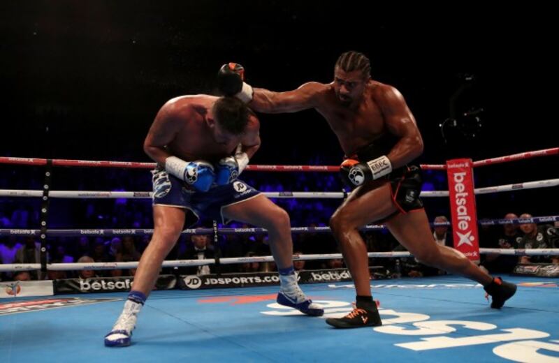 David Haye (right) takes on Tony Bellew during the heavyweight contest at The O2