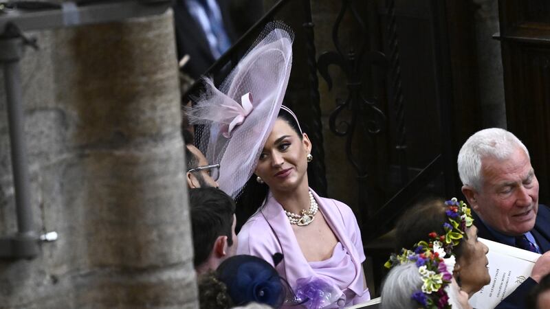 A video shows the star pacing up and down the aisle at Westminster in a bid to find her seat.