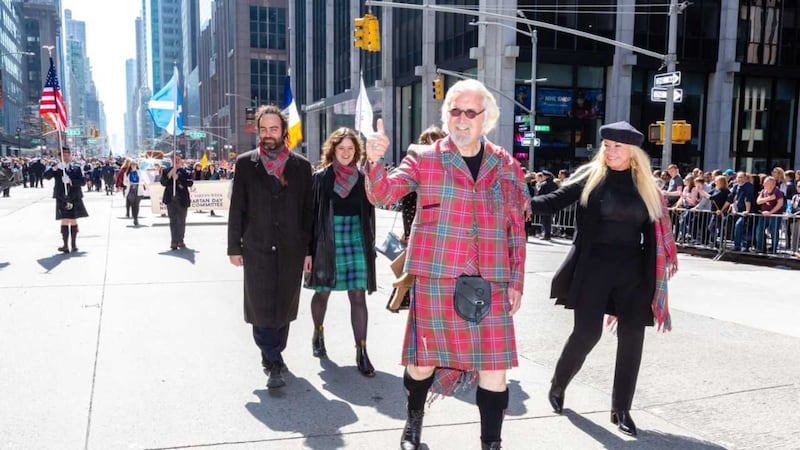The Scottish comedian was Grand Marshall and led thousands of participants, including pipers and Highland dancers, along Manhattan’s Sixth Avenue.