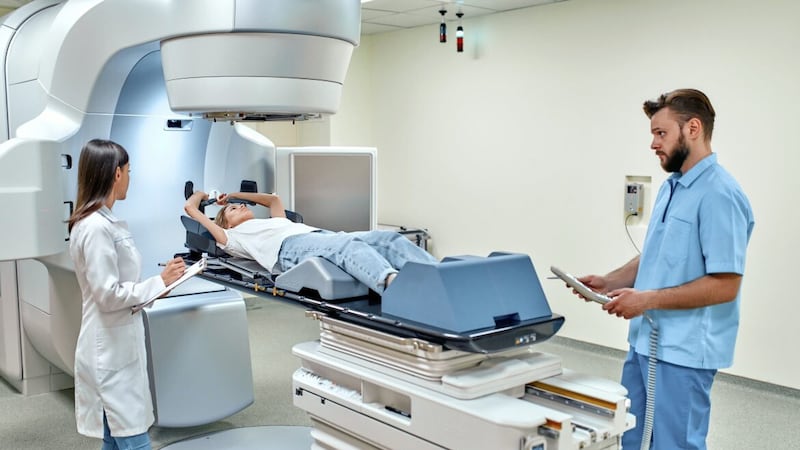 Patients traditionally lie flat for radiotherapy but sitting upright can mean reduced side-effects 