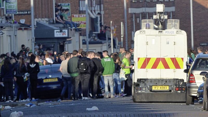 Police in the Holyands area of south Belfast on St Patrick&#39;s Day last year. Picture by Matt Bohill Pacemaker 