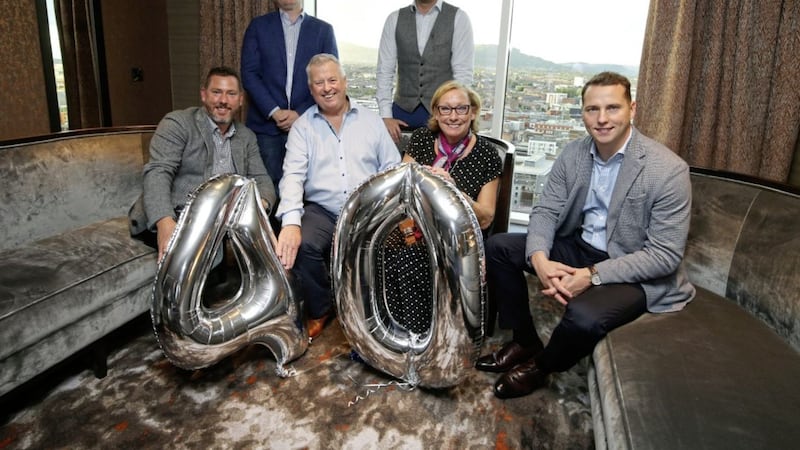 Willis Insurance and Risk Management executive chairman Robert Willis is joined by wife Dorothy and their four sons,who all work for the company. Front (from left) are Colin and Richard Willis; back (from left) are Mark and Stephen. Photo: Kelvin Boyes/PressEye 