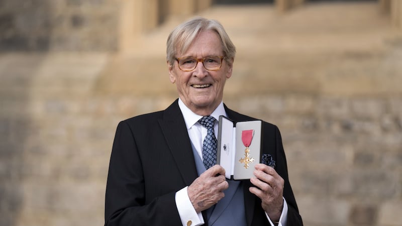 The 90-year-old Coronation Street actor was presented with his OBE at Windsor Castle.