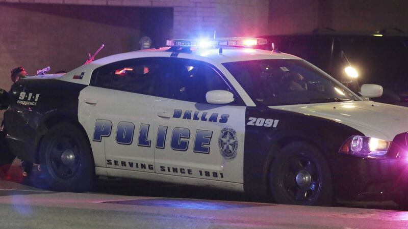 Dallas police respond after shots were fired during a protest over recent fatal shootings by police in Louisiana and Minnesota, Thursday, July 7, 2016, in Dallas. Snipers opened fire on police officers during protests; several officers were killed, police said. (Maria R. Olivas/The Dallas Morning News via AP)&nbsp;