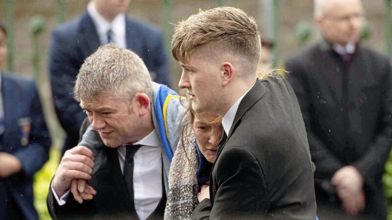 Morgan Barnard&#39;s mother is helped into St Patrick&#39;s Church in Dungannon during his funeral yesterday. Picture Mark Marlow. 