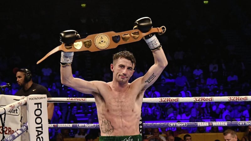 Tyrone McCullagh raises his winner&#39;s belt after defeating Joe Ham at the SSE Arena in Belfast. Picture: Colm Lenaghan/Pacemaker. 