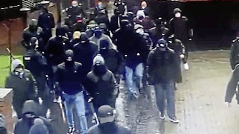 Video footage shows a group of masked men in the Pitt Park area of east Belfast 