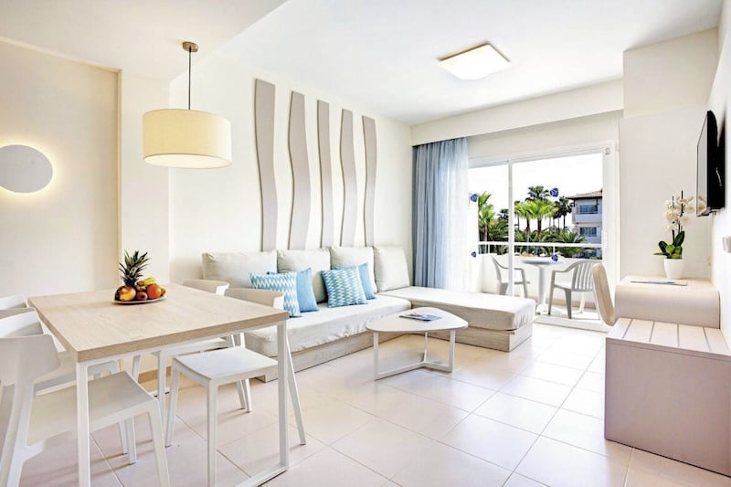 The spacious living area of an apartment in Grupotel Mallorca Mar in Cala Bona