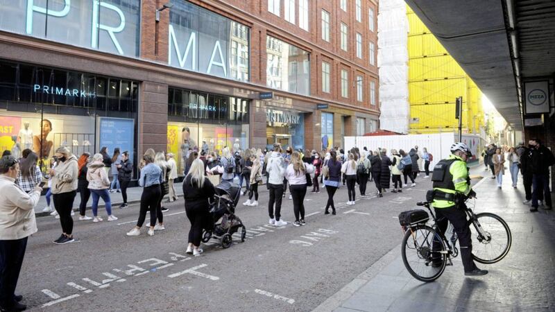 Shoppers queue outside Primark in Belfast as non-essential shops reopen in Northern Ireland following the easing of lockdown restrictions. Photo: Mark Marlow/PA Wire. 