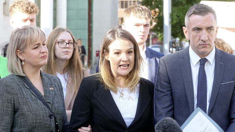 Loughlin Magin's daughter Grace speaks outside the High Court yesterday. Picture by Mal McCann