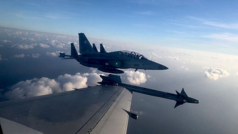 A Philippine Air Force FA-50PH jet fighter, joins the maritime patrol of the Philippines and the United States over Batanes and areas in the West Philippine Sea (Philippine Air Force via AP)