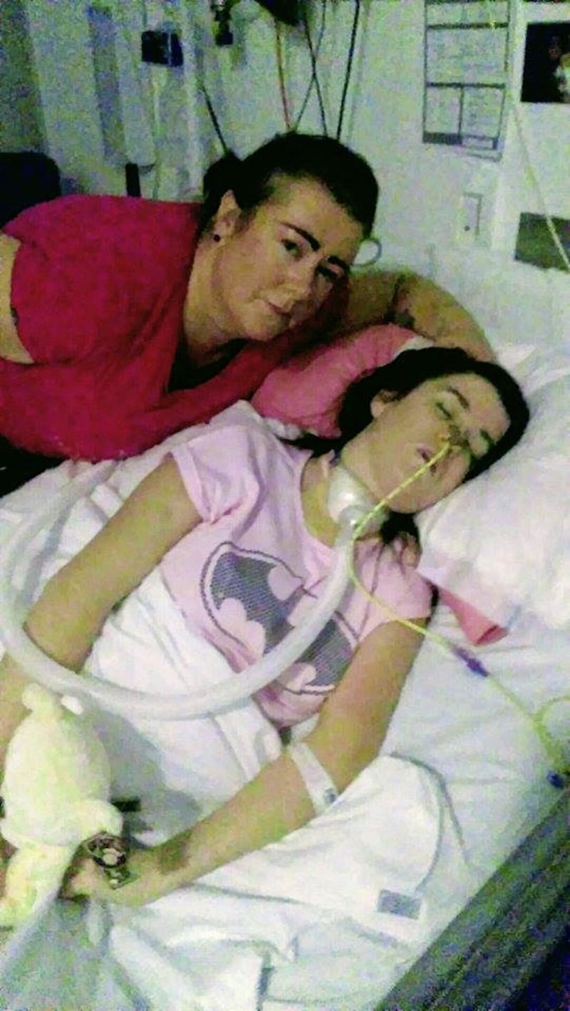 Joleen Corr pictured in her hospital bed with her mother, Carol 