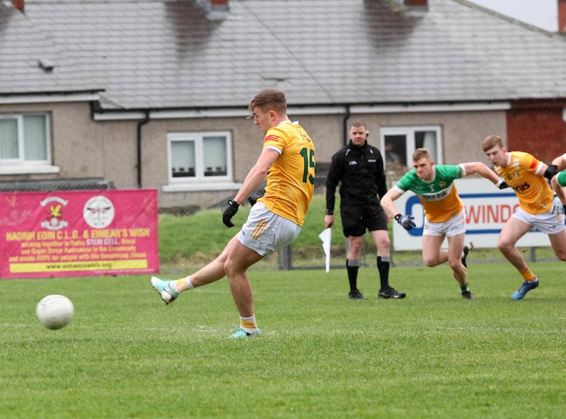 Antrim’s Dominic McEnhill scores a penalty during Sunday’s Allianz Football League Division 3 match at Corrigan Park in Belfast.
PICTURE: COLM LENAGHAN