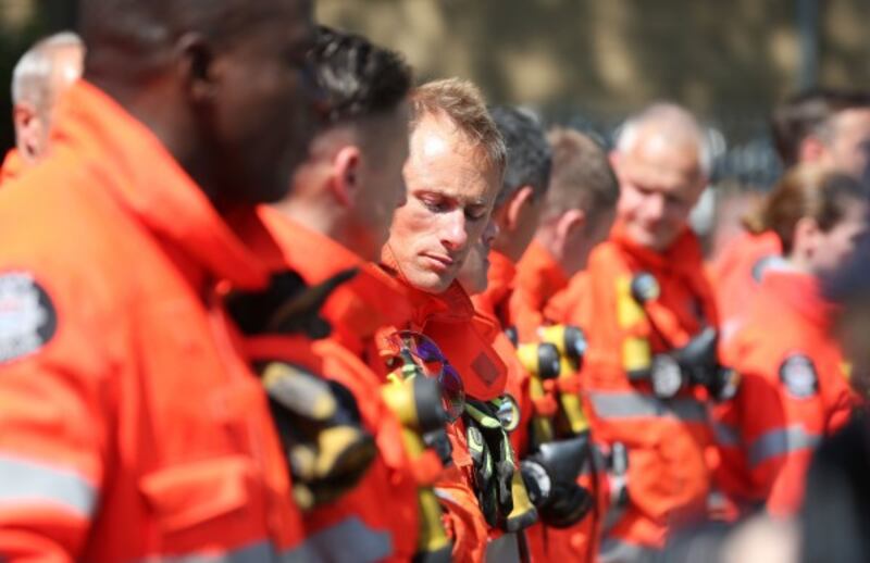 Members of the emergency services gather (Jonathan Brady/PA)