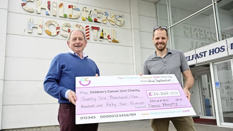 Denis Murphy (left) raised more than &pound;26,000 for The Children&rsquo;s Cancer Unit Charity, which supports the work of the Haematology and Oncology Unit at the Royal Belfast Hospital for Sick Children. Mr Murphy is pictured with Dr Johnston from the Unit 