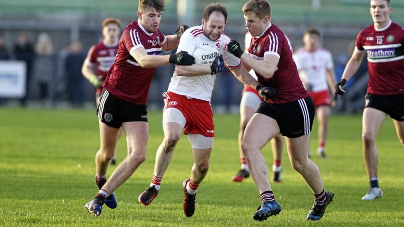Tyrone&#39;s Ronan McNabb comes under pressure from Stephen McConville and Oisin O&#39;Neill Picture by Seamus Loughran 