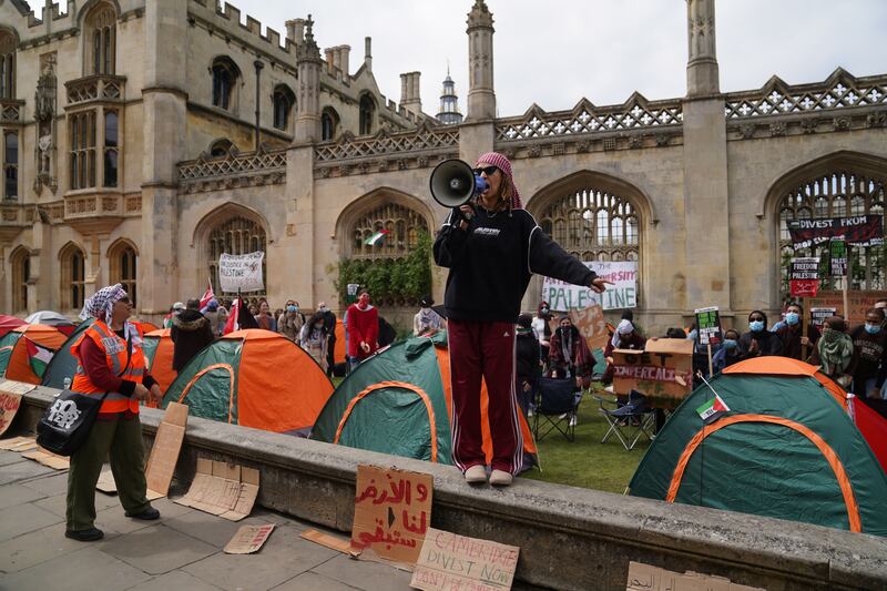 Students speaking at an encampment on the grounds of Cambridge University, protesting against the war in Gaza