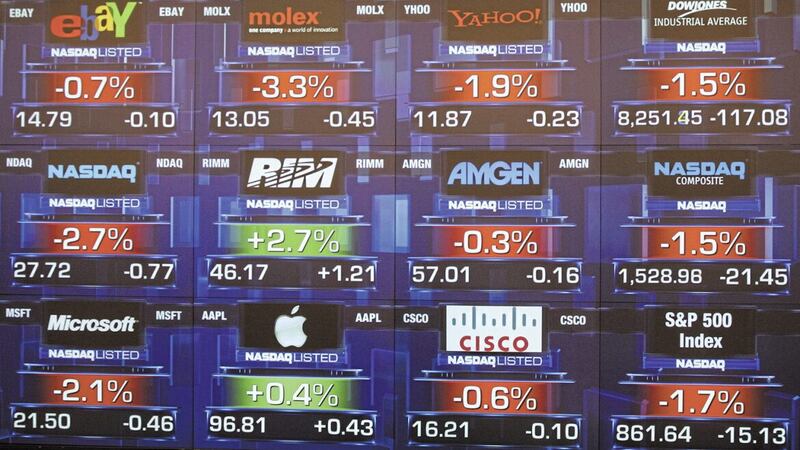 Electronic screens show stock prices at the Nasdaq  