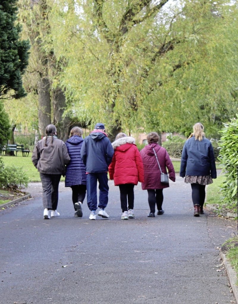 A group from the L&#39;Arche Community in Belfast take a stroll through Botanic Gardens, close to Queen&#39;s University. L&#39;Arche has entered into a partnership with the Catholic Chaplaincy at the university. Picture by Molly Campbell 