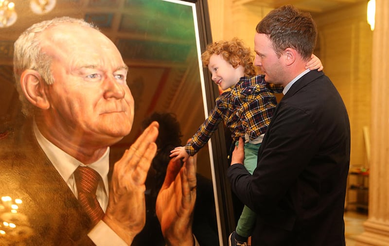Martin McGuinness son Fiachra and grandson Dulta at the unveiling of the portrait of the former deputy First Minister at Parliment Buildings. Picture Mal McCann&nbsp;