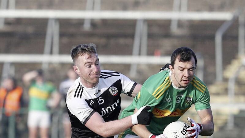 Glen&#39;s Michael Warnock and Kilcoo&#39;s Paul Devlin battle it out during Sunday&#39;s Ulster final Picture: Philip Walsh. 