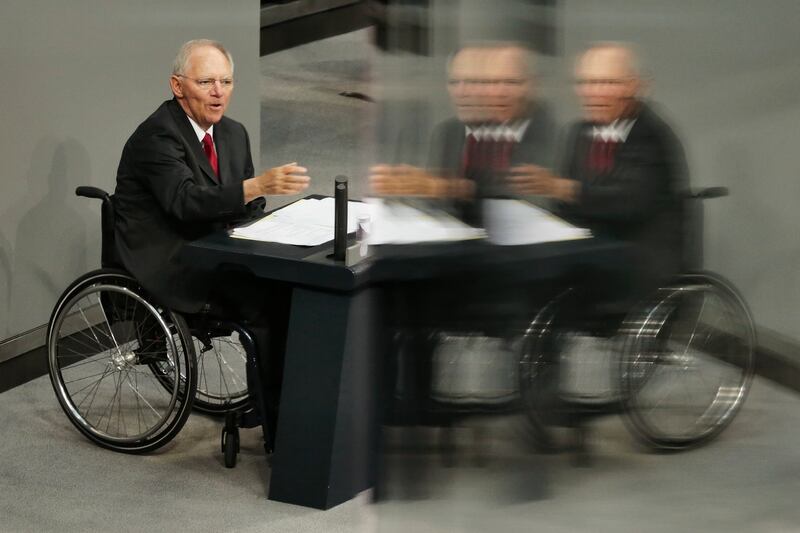 German finance minister Wolfgang Schaeuble delivers his speech during the first day of the debate about the German budget for 2014 at the Bundestag in Berlin (Markus Schreiber/AP)