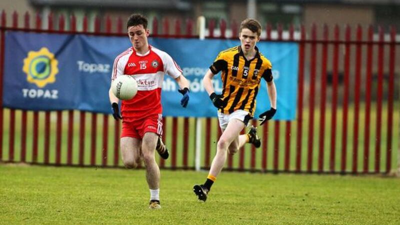 Kilrea's Patrick Quigg gets away from Crossmaglen's Cormac Donnelly in Saturday's Ulster Minor Football game at St Paul's Belfast. Picture Seamus Loughran&nbsp;