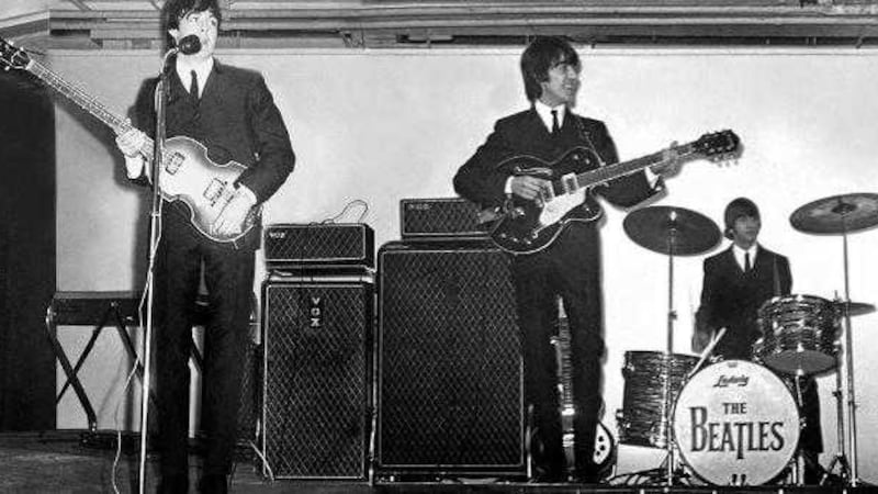 The Beatles playing at the King&#39;s Hall in Belfast in November 1964. The photographs which are part of a private collection by Canadian photographer Nick Newbery 