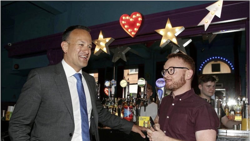 Taoiseach Leo Varadkar with bar manager Mark Hassan during a recent visit to Belfat&#39;s &#39;gay quarter&#39;. Picture by Hugh Russell 