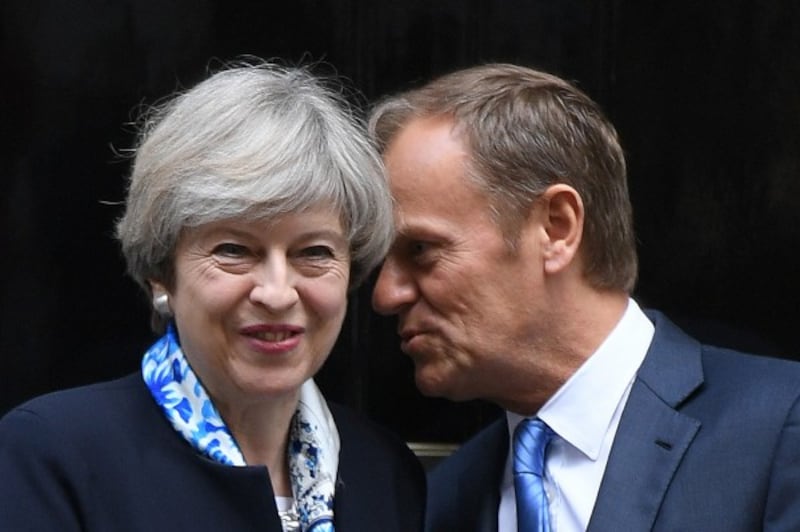  Theresa May greets Donald Tusk (Stefan Rousseau/PA)