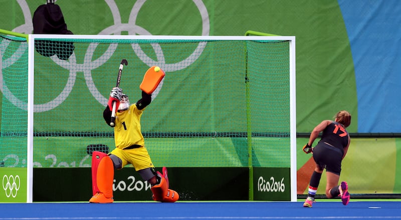 Great Britain’s goalkeeper Maddie Hinch saves a penalty from the Netherlands’ Maartje Paumen during the gold medal match at the Olympic Hockey Centre on the 14th day of the Rio Olympic Games, Brazil