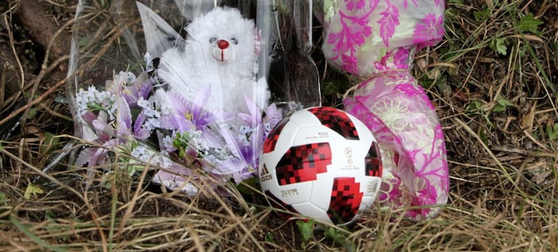 Tributes left at the roadside following the crash. Picture by Ann McManus