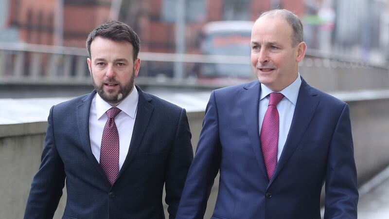 Colum Eastwood of the SDLP and Miche&aacute;l Martin of Fianna F&aacute;il arriving for at a joint press conference in Belfast as their political parties announce a new partnership
