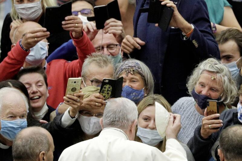 Pope Francis was 'close to the sheep' - many not wearing face coverings - at his general audience earlier this month. Picture by AP Photo/Gregorio Borgia