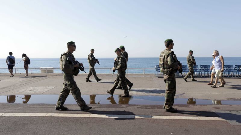 Soldiers patrol the Promenade des Anglais in Nice, southern France. Picture by Claude Paris, Associated Press
