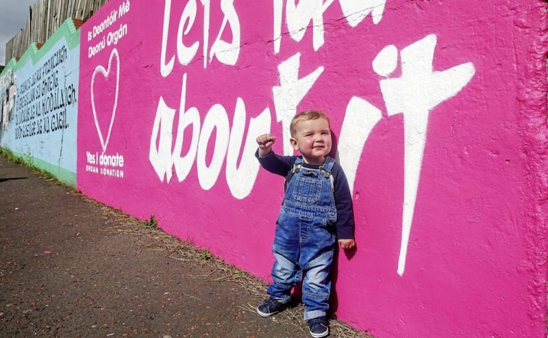 D&aacute;ithi MacGabhann at the new organ donation mural on the Whiterock Road in west Belfast in 2018. Picture by Mal McCann