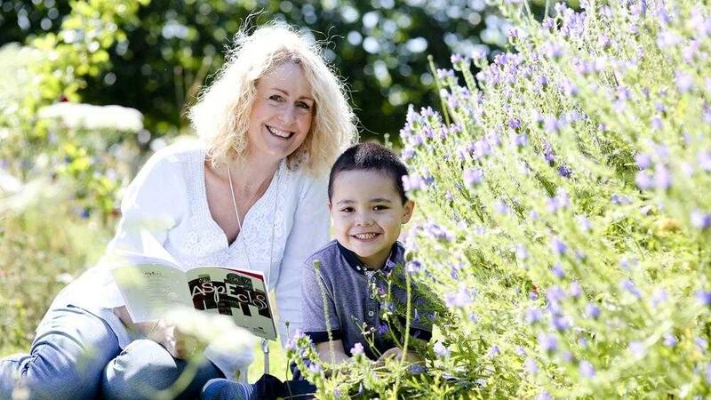 Author Lesley Allen with young friend at Bangor Castle Walled Garden 