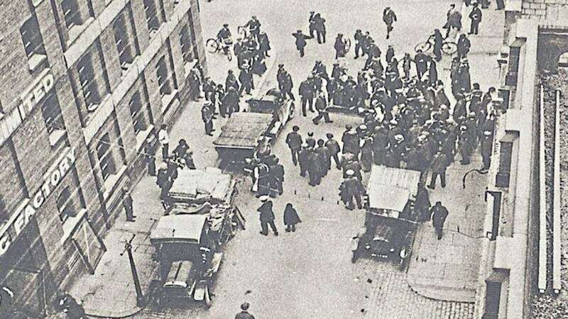 The aftermath of a shooting incident on Little Donegall Street in July 1921 