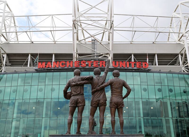 A statue of Manchester United’s ‘Holy Trinity’ of Sir Bobby Charlton, George Best and Denis Law stands outside Old Trafford. Picture by Richard Sellers/PA