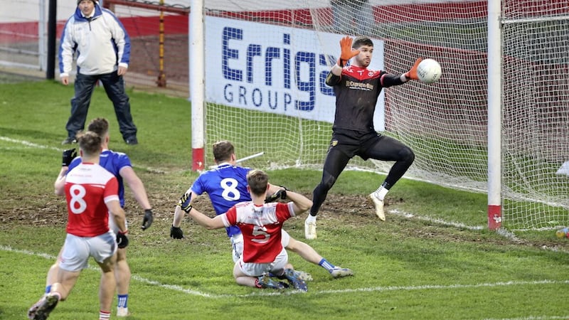 Galbally&#39;s Enda McGarrity makes an early goal challenge on Dungloe keeper Danny Rodgers during the Ulster Club Intermediate Football Championship semi-final played at Celtic Park on Sunday Picture: Margaret McLaughlin. 