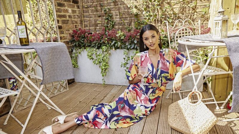 Chi Chi London Cut-Out Floral Maxi Dress in Navy, &pound;40.60 (was &pound;58), available from Chi Chi London (accessories, stylist&#39;s own) 