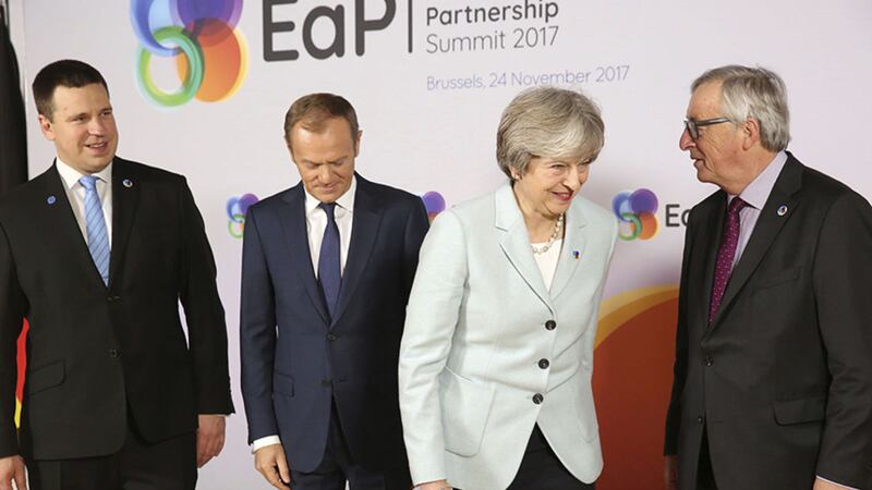 British Prime Minister Theresa May, second right, poses with from left, Estonian Prime Minister Juri Ratas, European Council President Donald Tusk and European Commission President Jean-Claude Juncker during arrivals for an Eastern Partnership Summit in Brussels, Friday, November 24, 2017&nbsp;