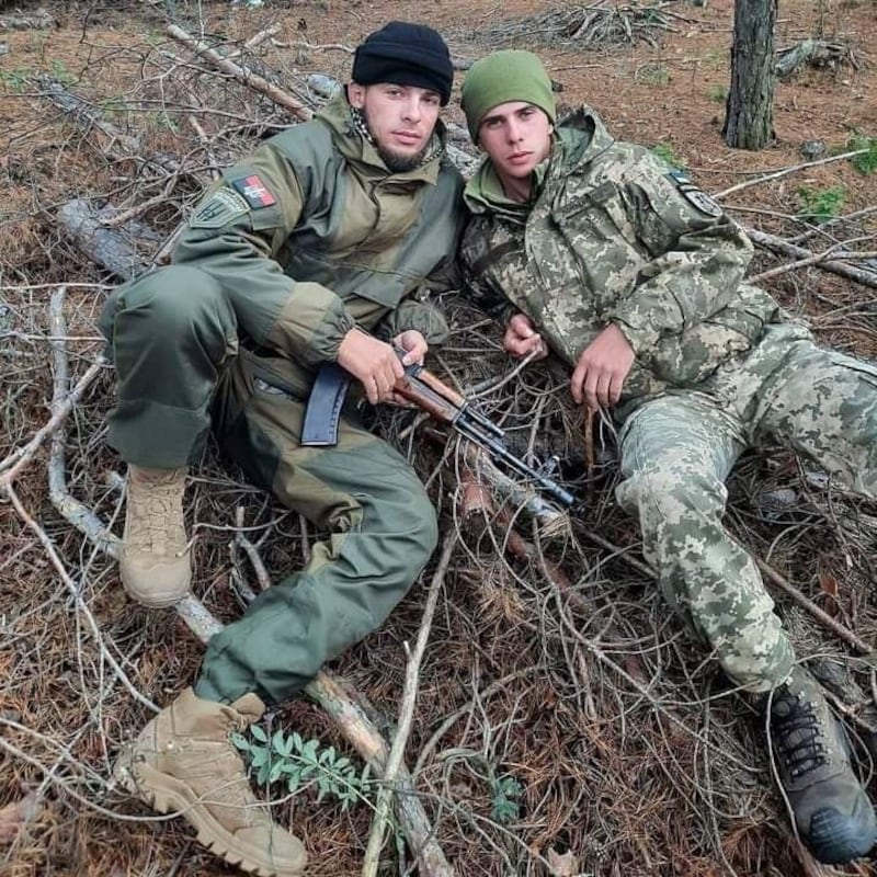 Georgiy Roshka (left) with a fellow solider before his arm was amputated